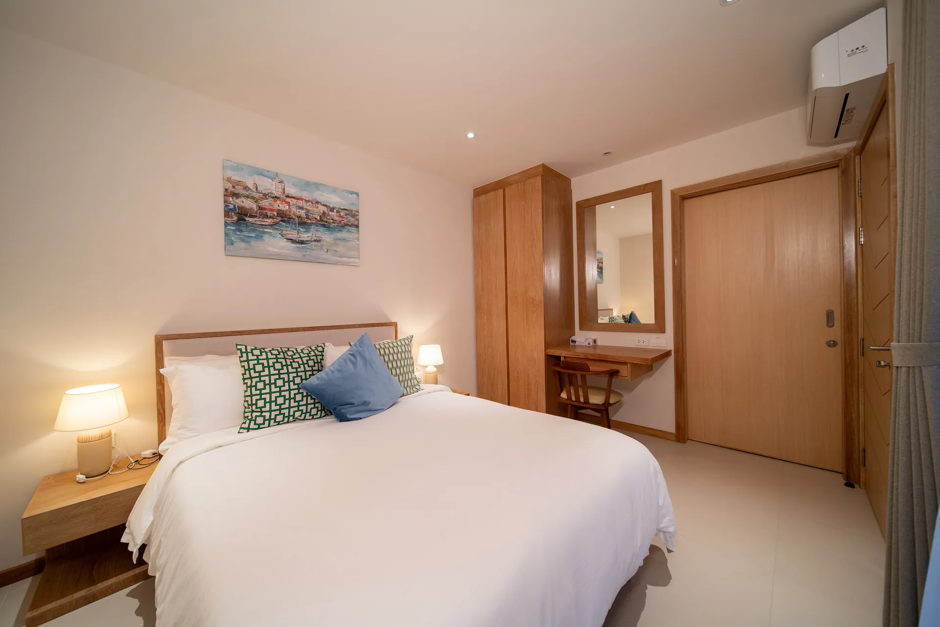 Third bedroom with a double bed, a wardrobe and a dressing table with a mirror
